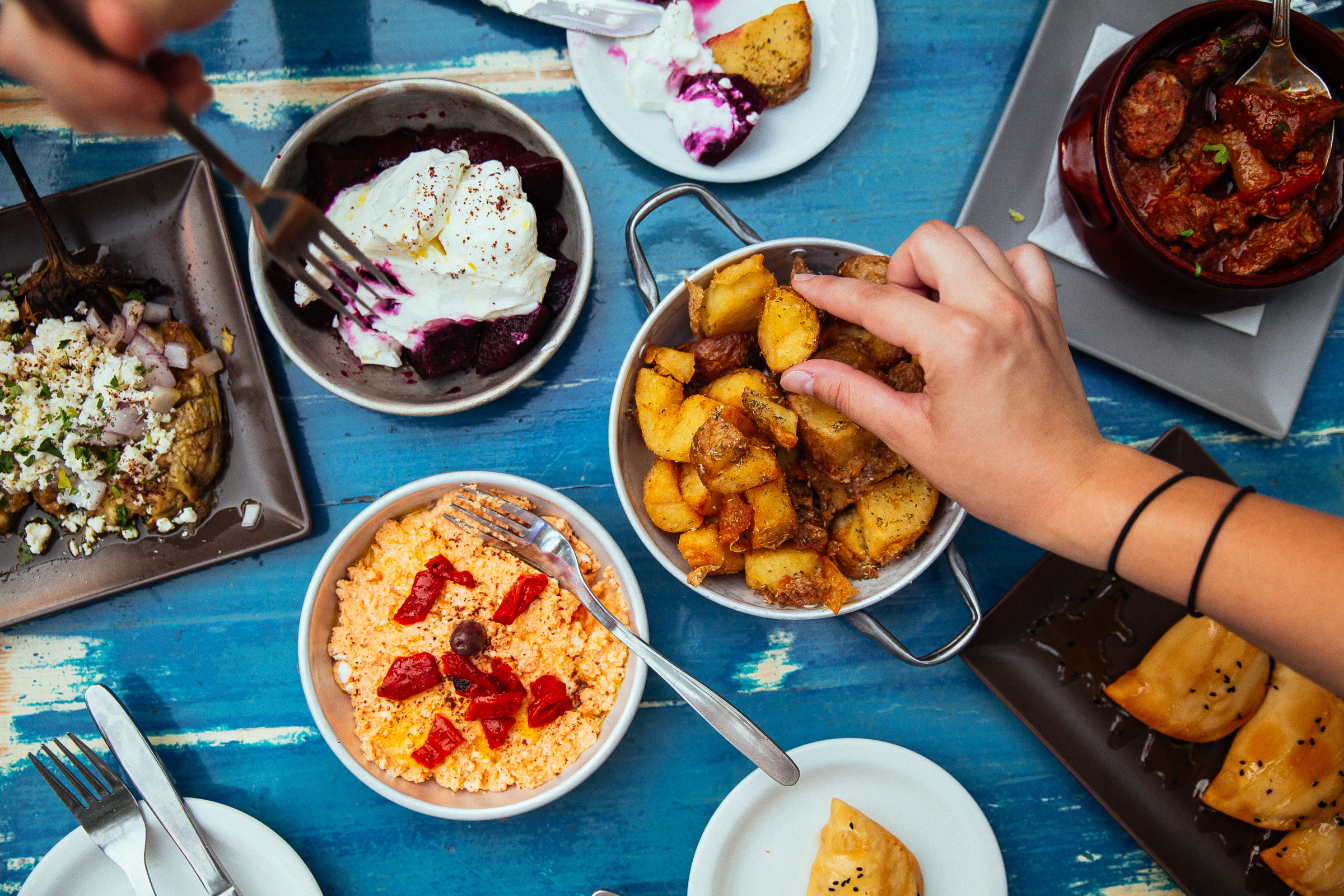 table with food and blue table cloth