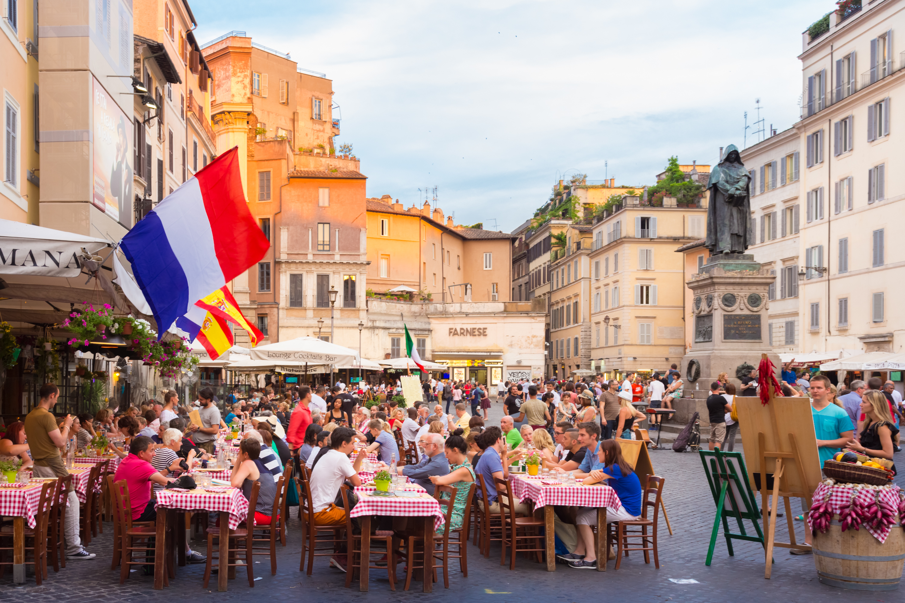 Tourists eating outside Pizza in Rome