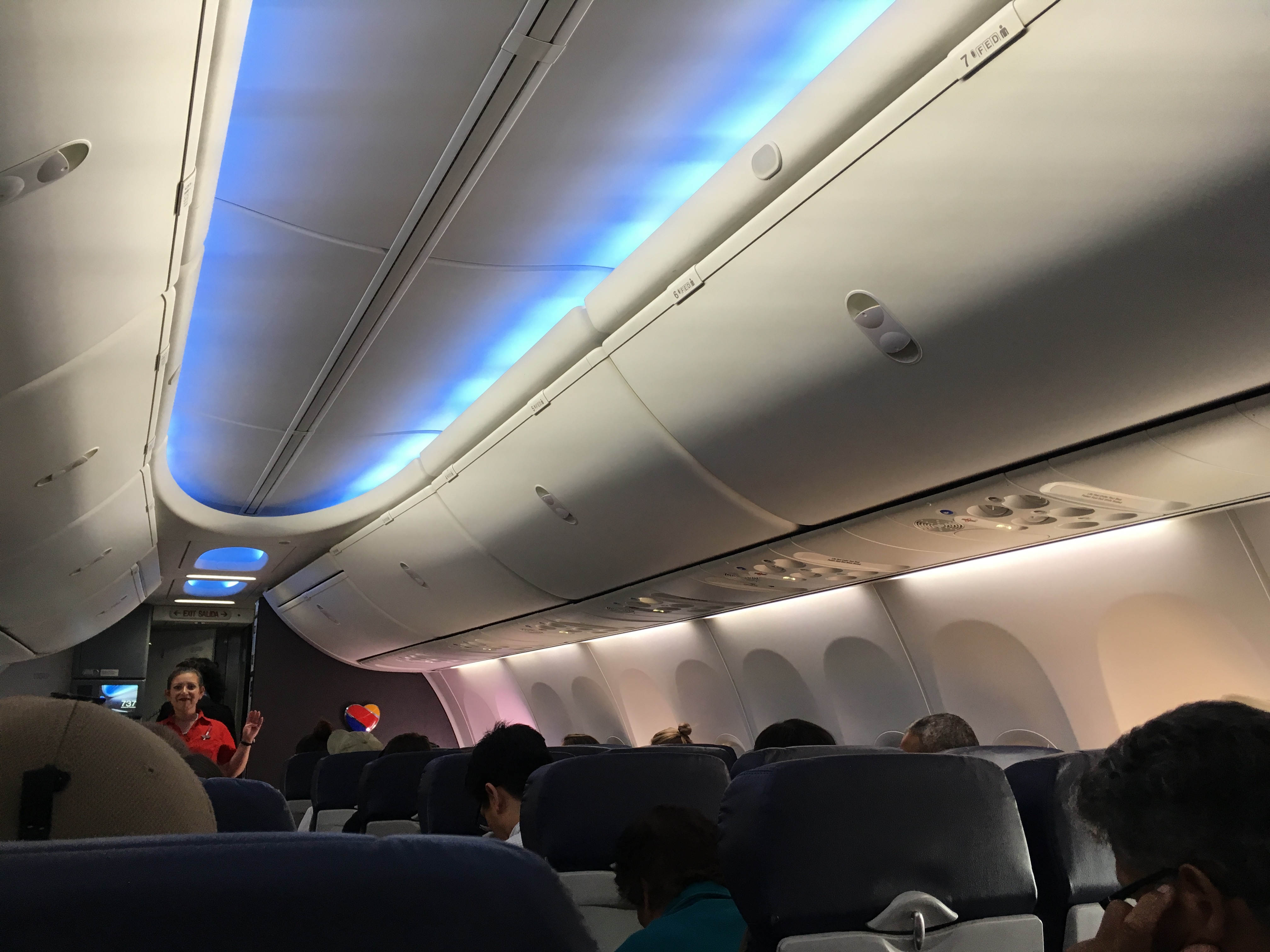 A Southwest Airlines flight attendant leads a safety demonstration