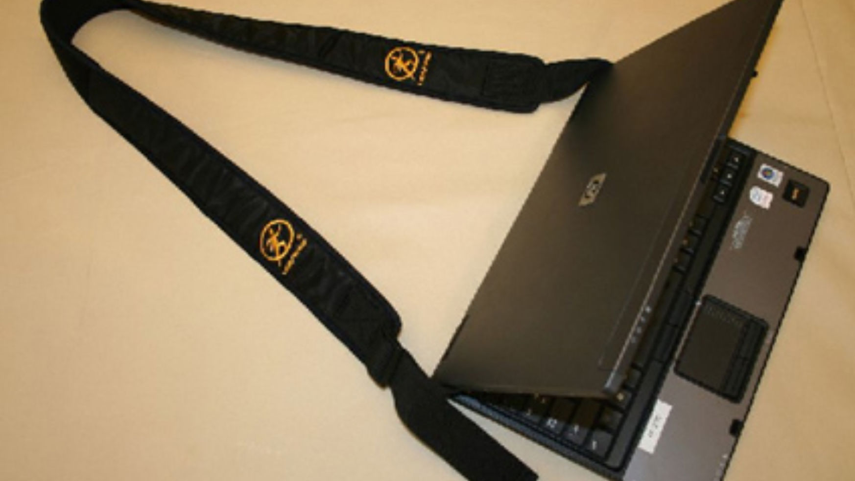 Gear: A shoulder strap for your laptop | Budget Travel