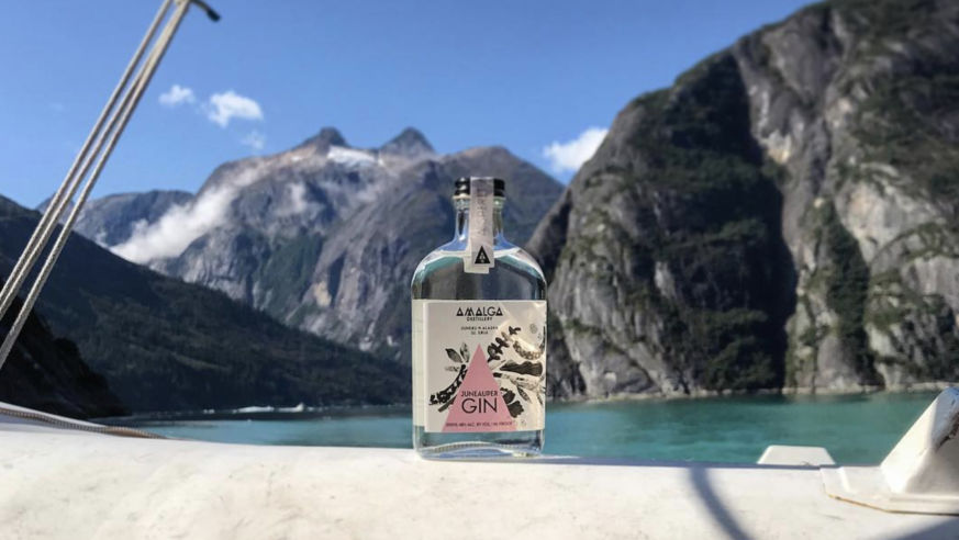 bottle of gin mountain in background