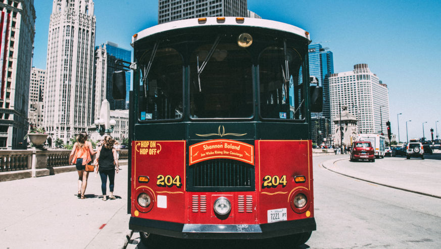 Red Chicago Trolley car on street