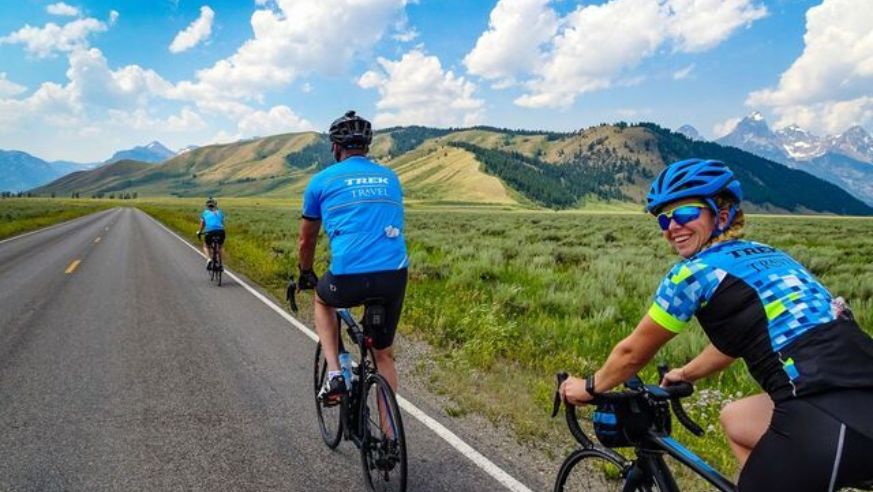 A view of cyclists on a road in Yellowstone National Park
