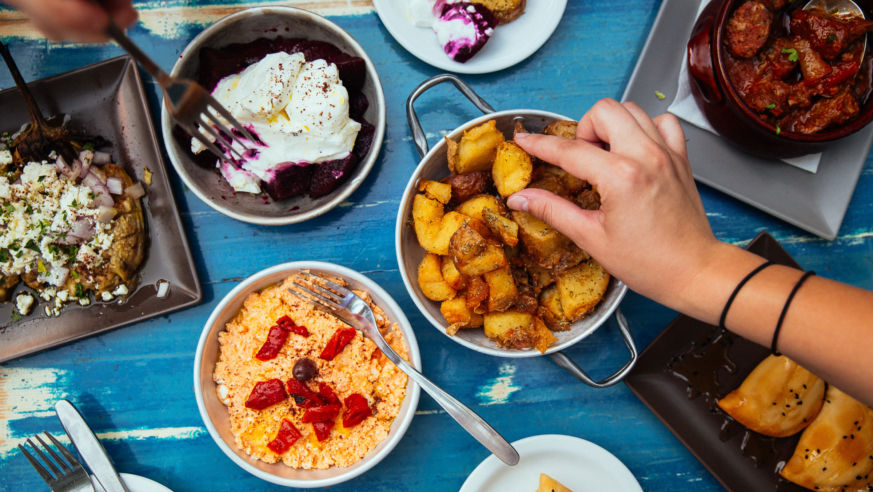 table with food and blue table cloth
