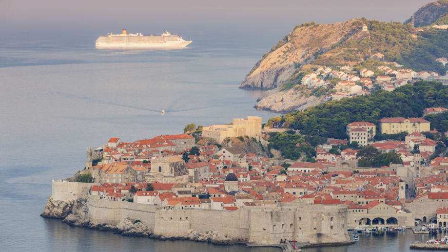 A cruis ship passes in the distance of Dubrovnik's Old Town