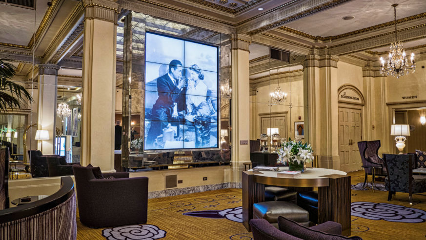 Lobby of hotel with TV screen