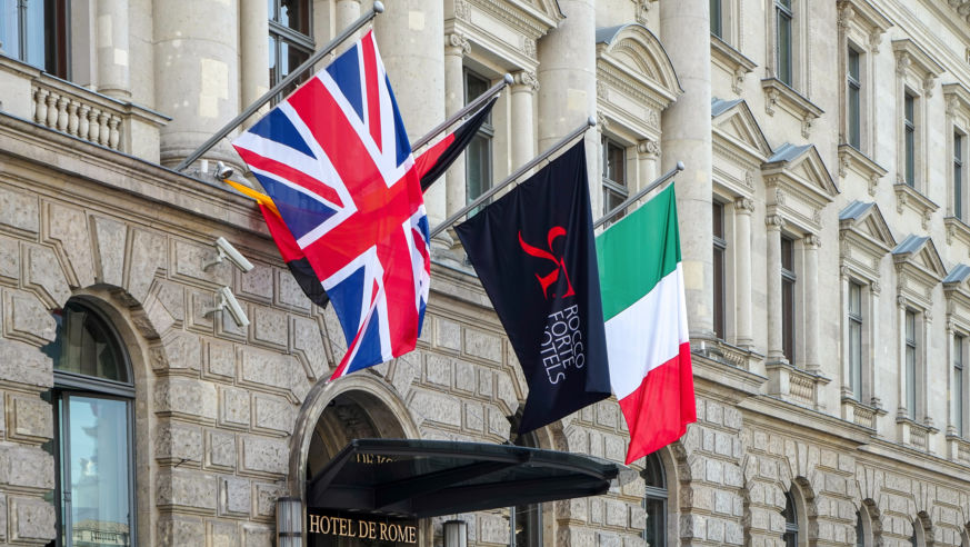 German hotel exterior with International flags