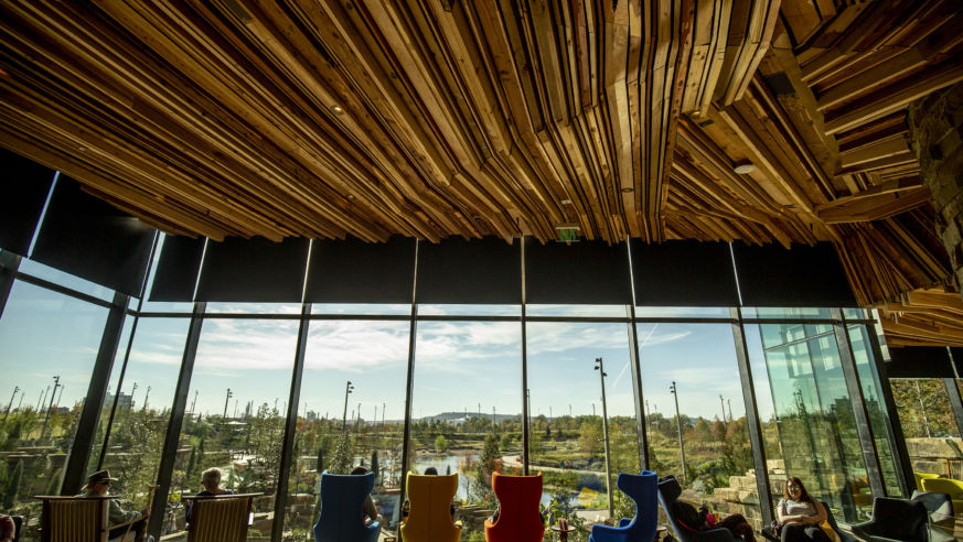 chairs sitting at big window with view