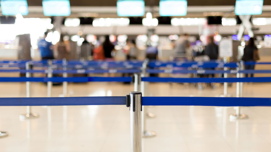 A view of airport security lines, blurry
