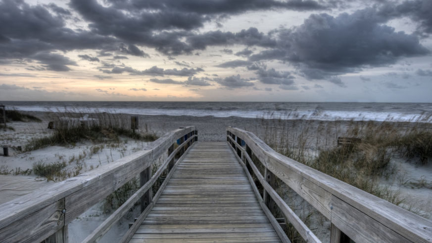 A view of the entrance to a beach at sunset on Tybee Island, Georgia.