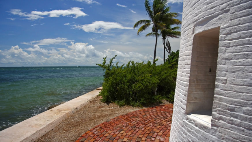 A view of the ocean and historic structures at Bill Baggs State Park, Florida