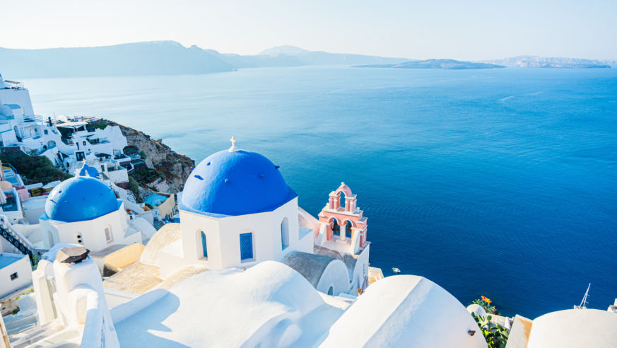 Blue Waters And Domes Of Santorini