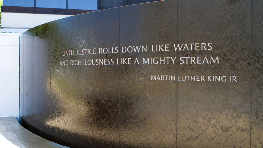 A view of the Civil Rights Memorial in Montgomery, Alabama, with a quote from Martin Luther King Jr.