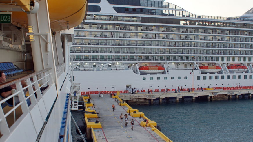 Passengers boarding a cruise ship
