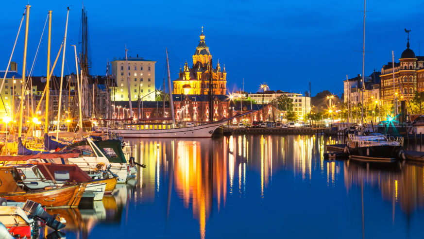 A view of Helsinki, Finland's Old Town with water and boats.