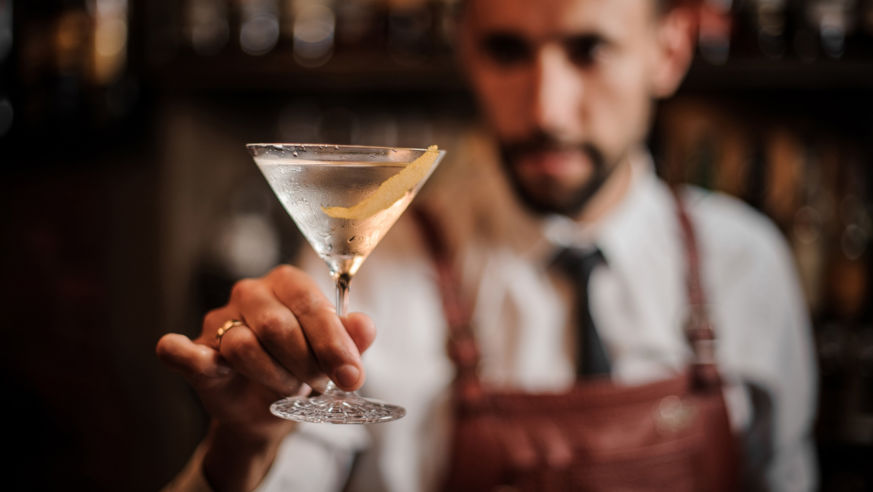 bartender holding drink