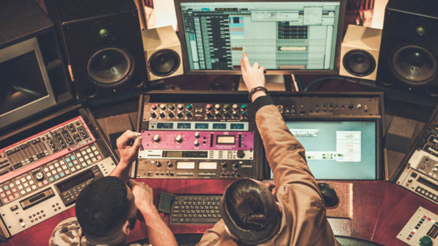 two men at music board