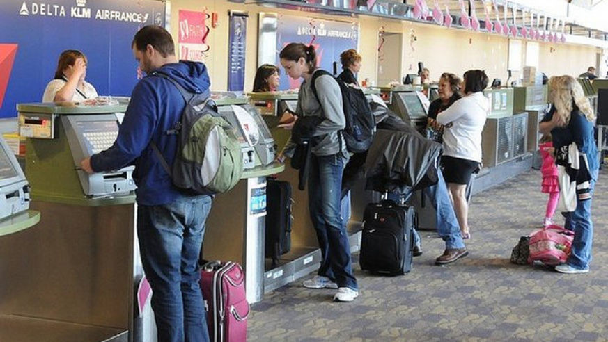 People at an airline ticket counter
