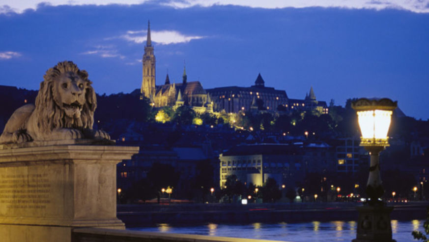 Lion statue overlooking Budapest, Hungary