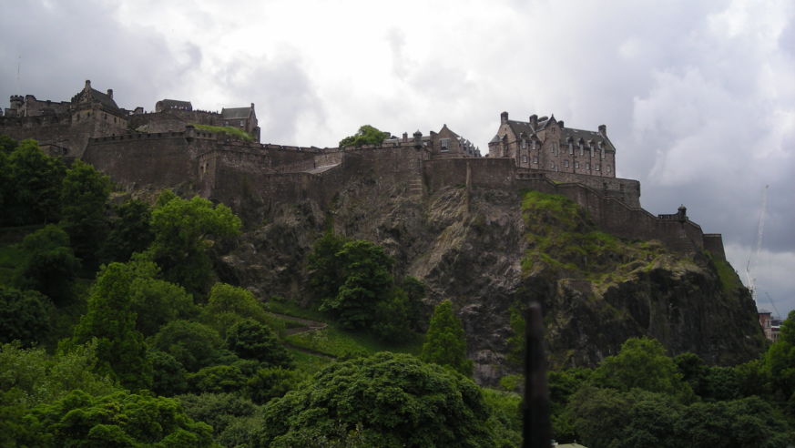 People enjoying sunshine in Princes Street Gardens.
