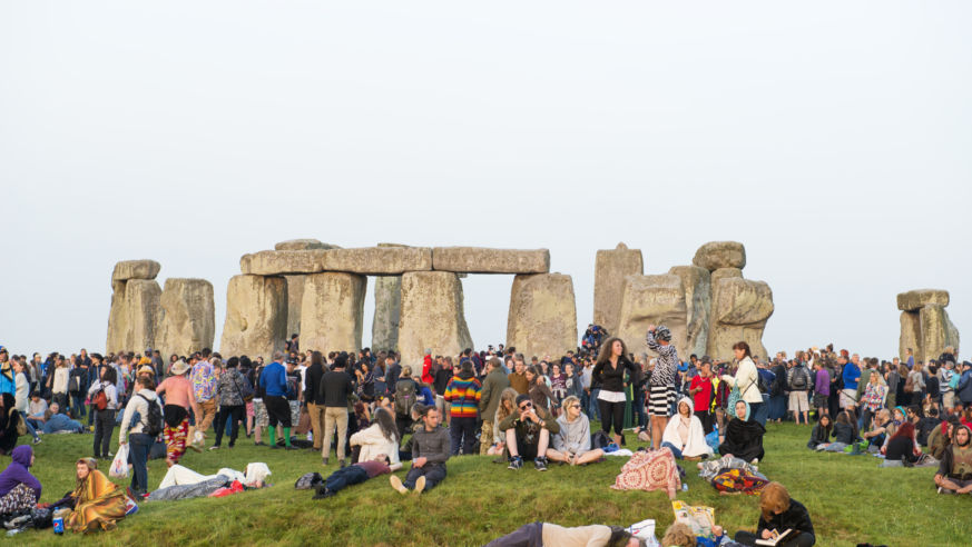 A view of the standing stones at Stonehenge with summer solstice celebration