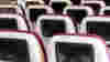 Airplane coach interior seats with screens
