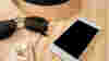 Earbuds, smartphone, sunglasses