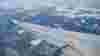 PlaneWindowSlideshow_ItalianAlps