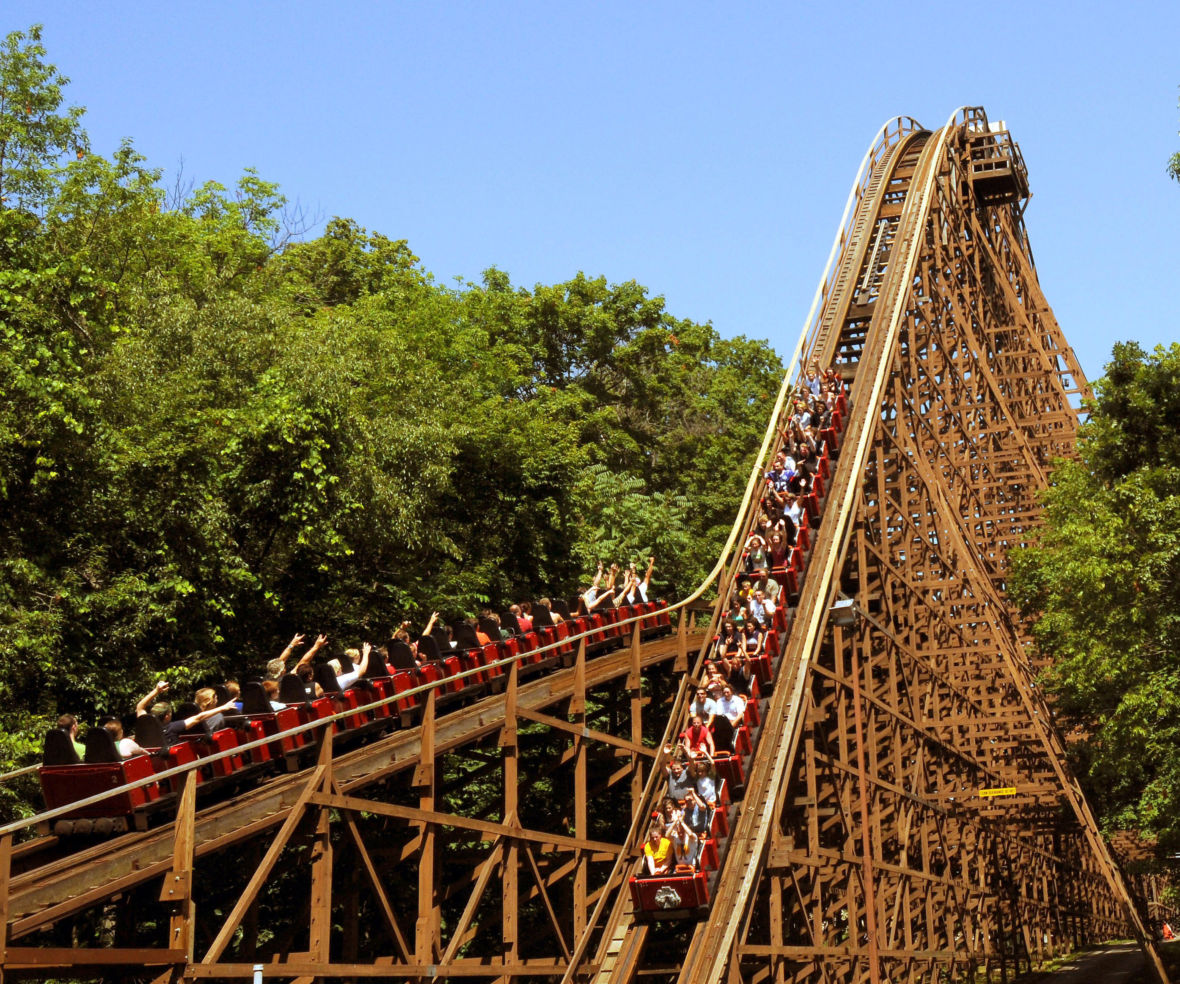 Coasters running at the same time pass each other on the Beast at Kings Island.