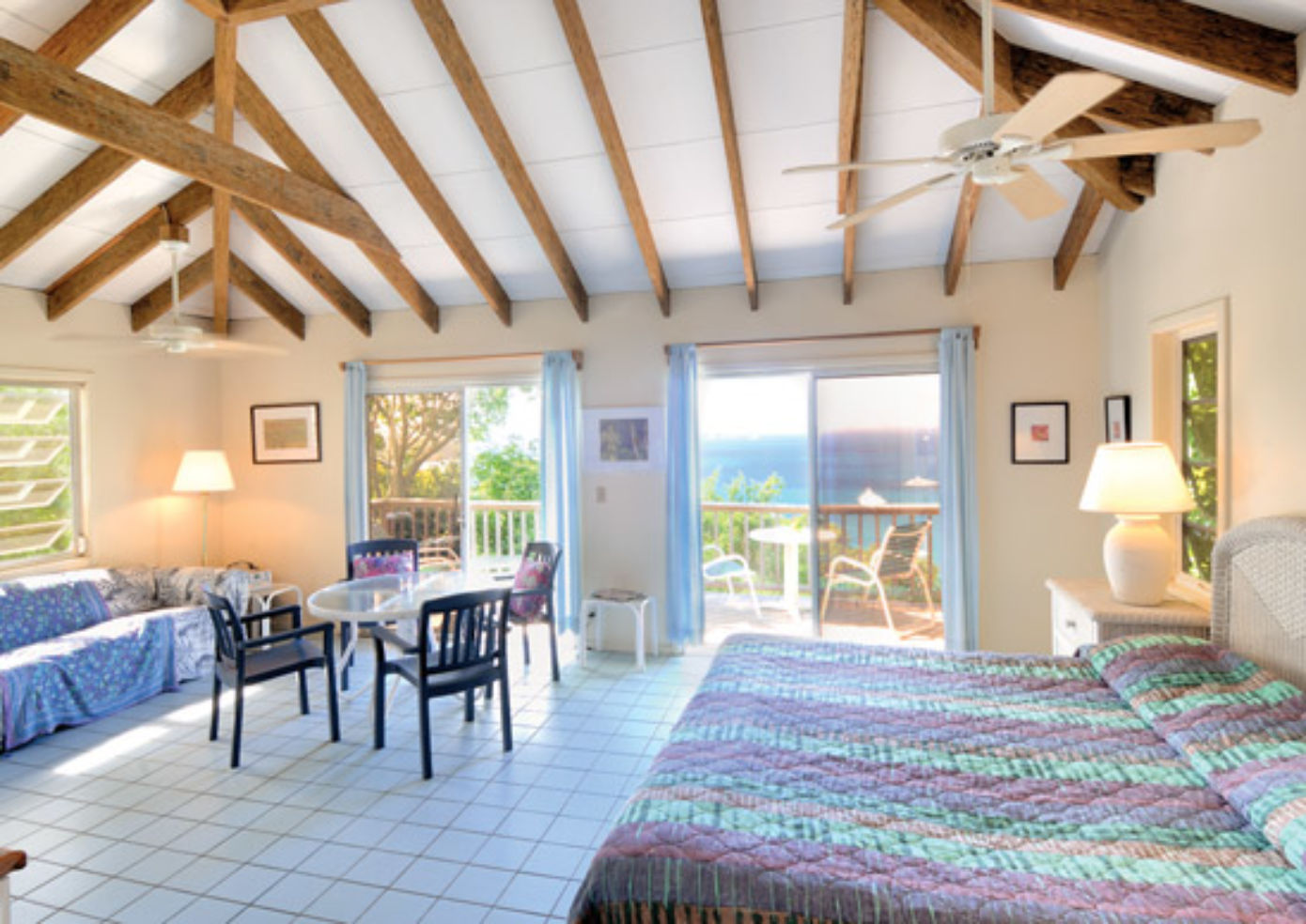 Harmony Studios, 12 airy apartments nearby Maho Bay Camps, have kitchenettes, lofted ceilings, and large decks with water views.