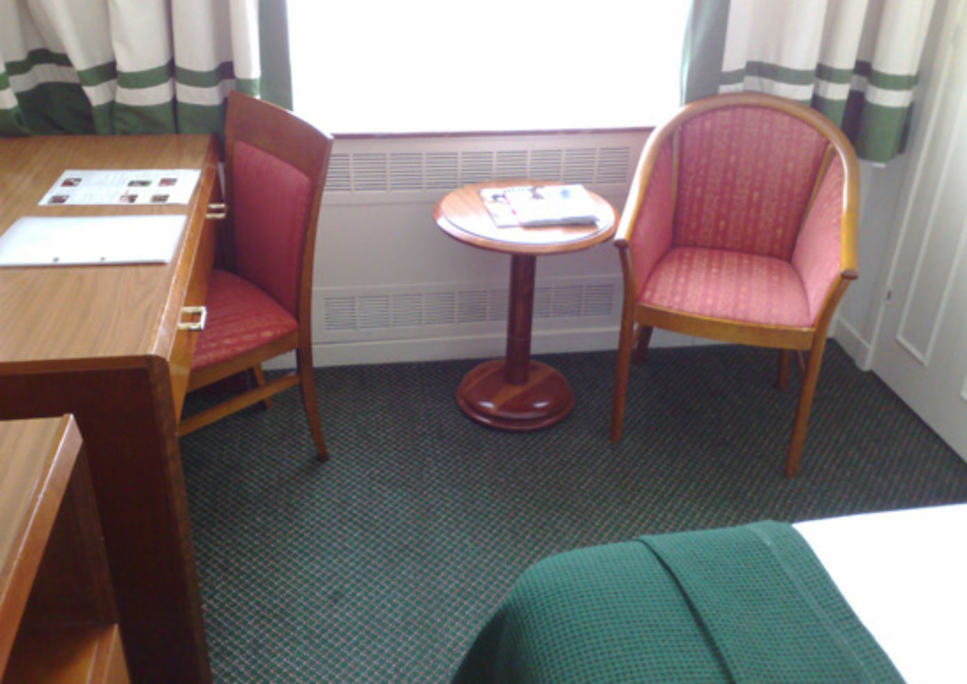 A guest room at Strand Palace Hotel