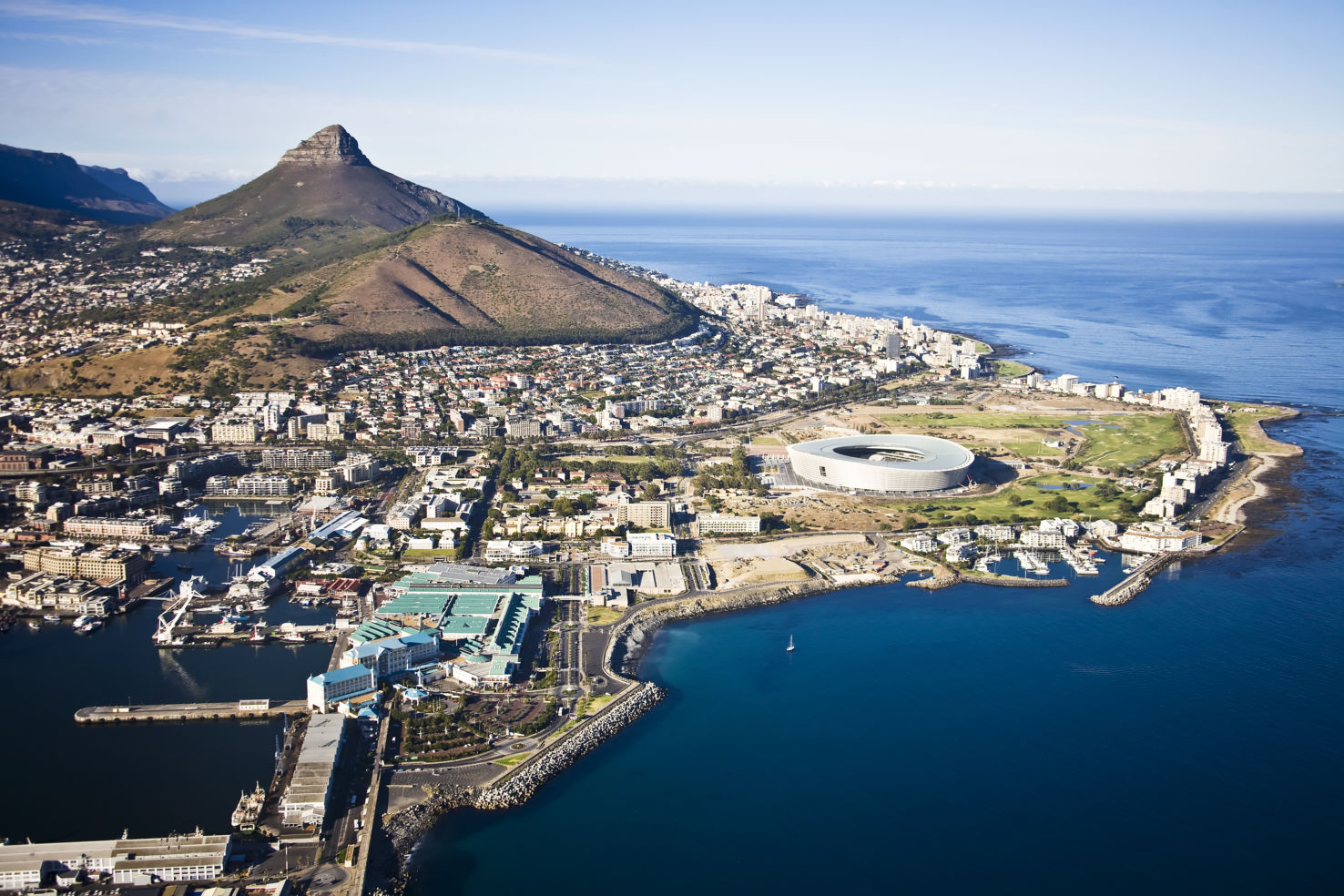 Aerial view of Cape Town Stadium, Greenpoint common, V&A Waterfront and Lion's Head, Cape Town, South Africa.