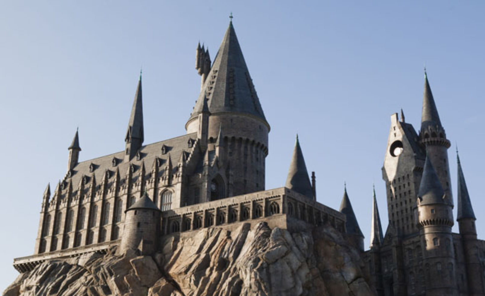 Guests experience the magnificence of Hogwarts castle as it towers above Hogsmeade at The Wizarding World of Harry Potter, only at Universal Orlando Resort.