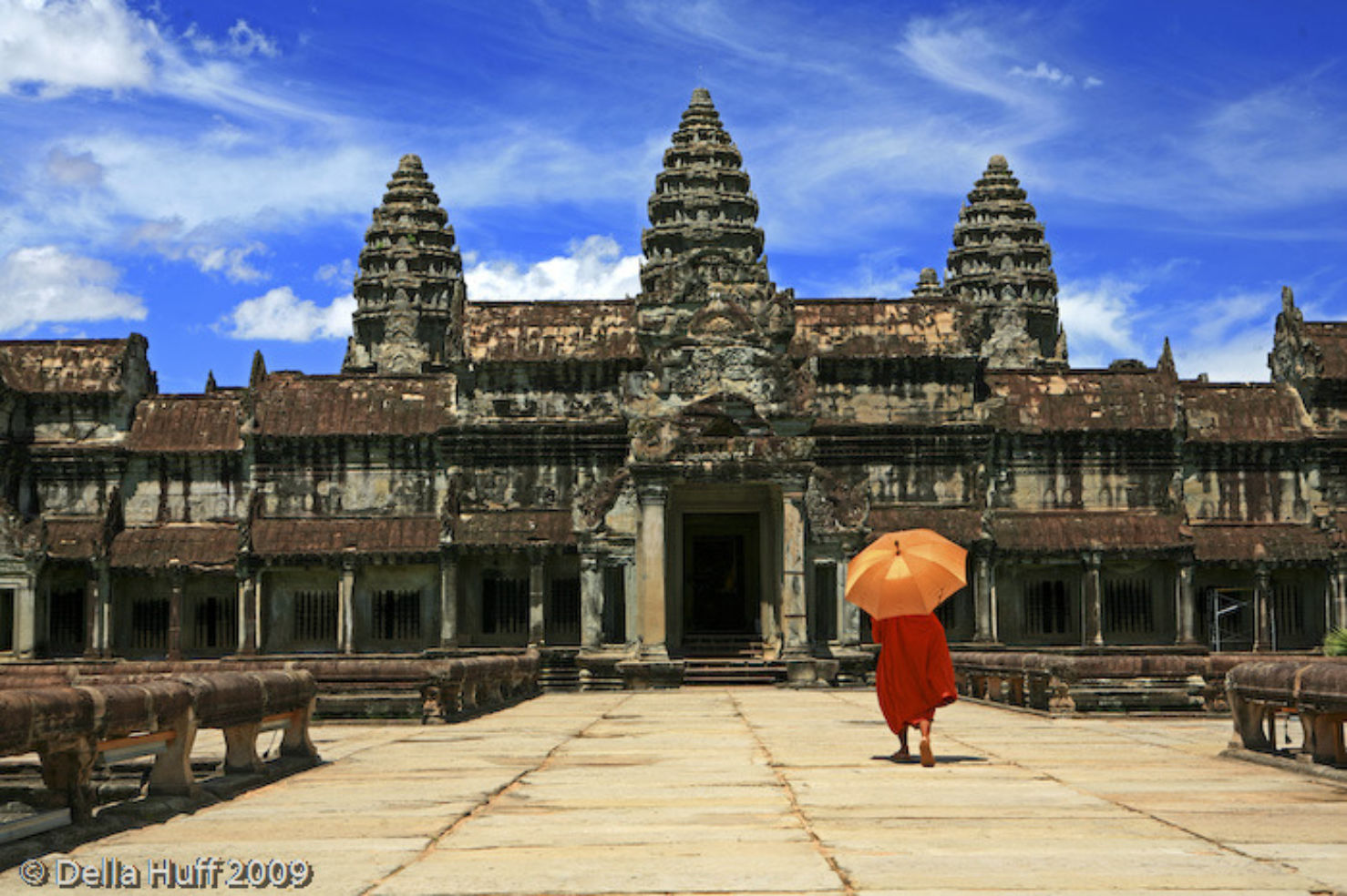 A monk visits the ruins of Angkor Wat in Cambodia.