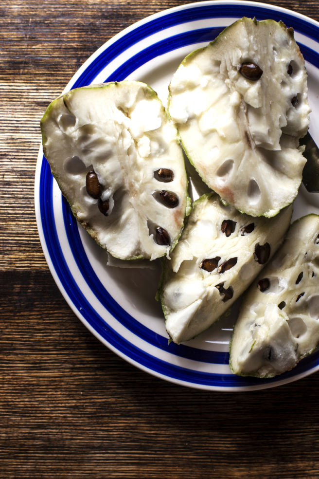 Fresh plate of Cherimoya fruit, a custard apple that is native to the Andes