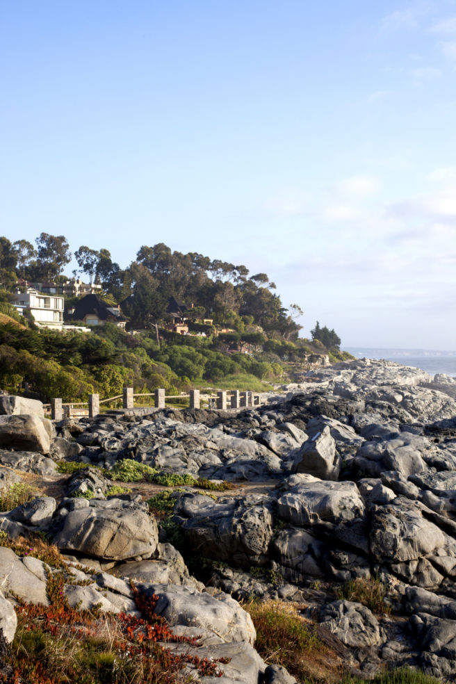 Houses overlooking the Pacific perched along Zapallar's rocky coastline
