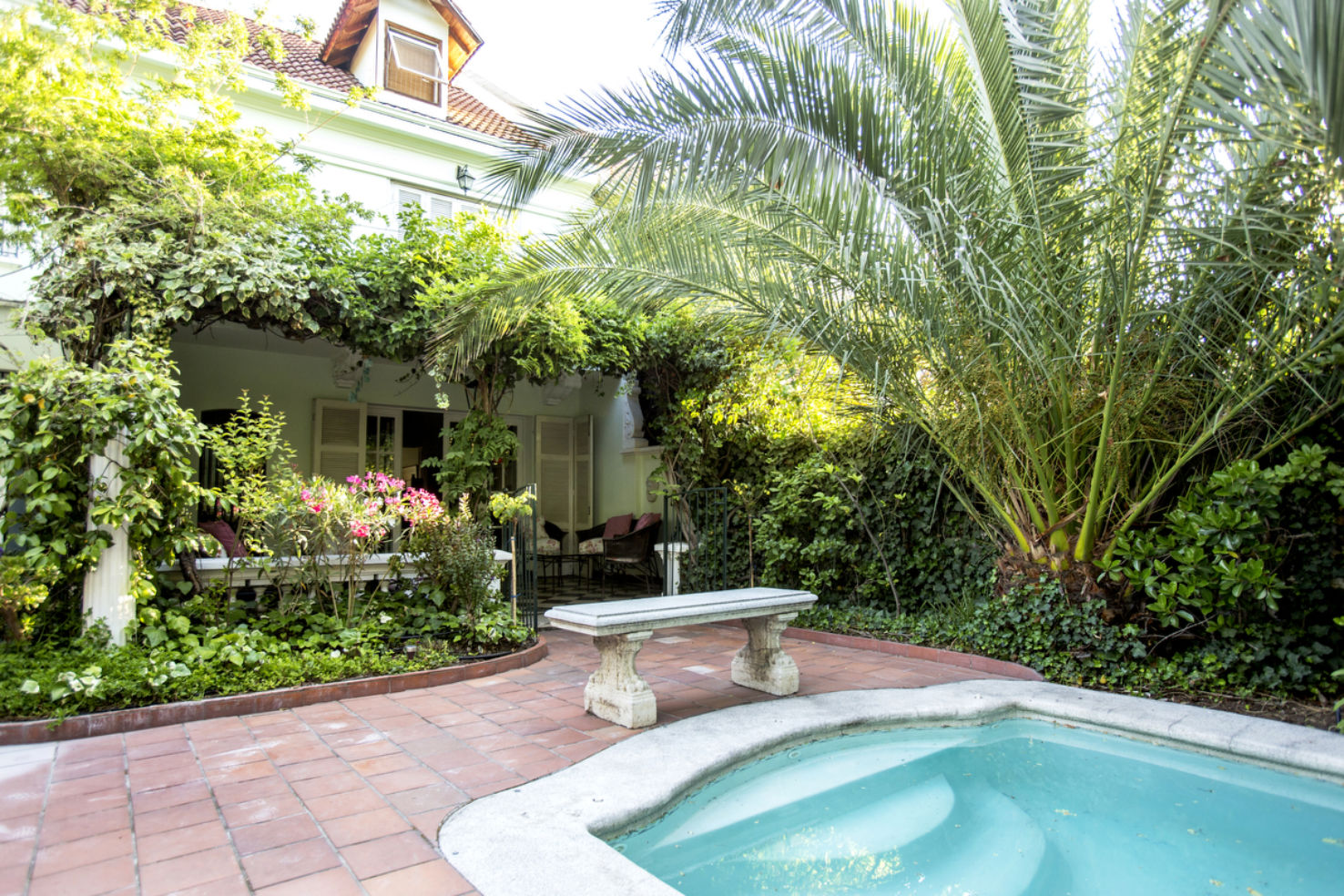The tranquil environment of Hotel L'Ambassade on a quiet street in Santiago