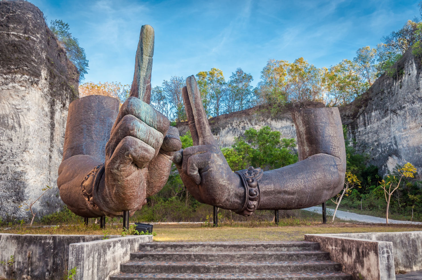 Image of giant floating arms at Garuda Wisnu Kencana Cultural Park, Bali, Indonesia.