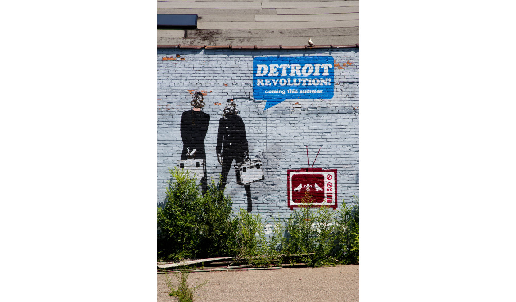 The revolution will be televised, at least according to this street art spotted in a back parking lot in Midtown Detroit.