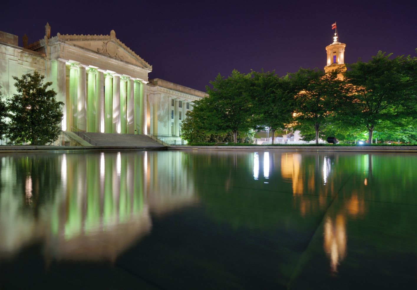 Nashville War Memorial Auditorium and Tennessee State Capitol in Nashville, Tennessee, USA.