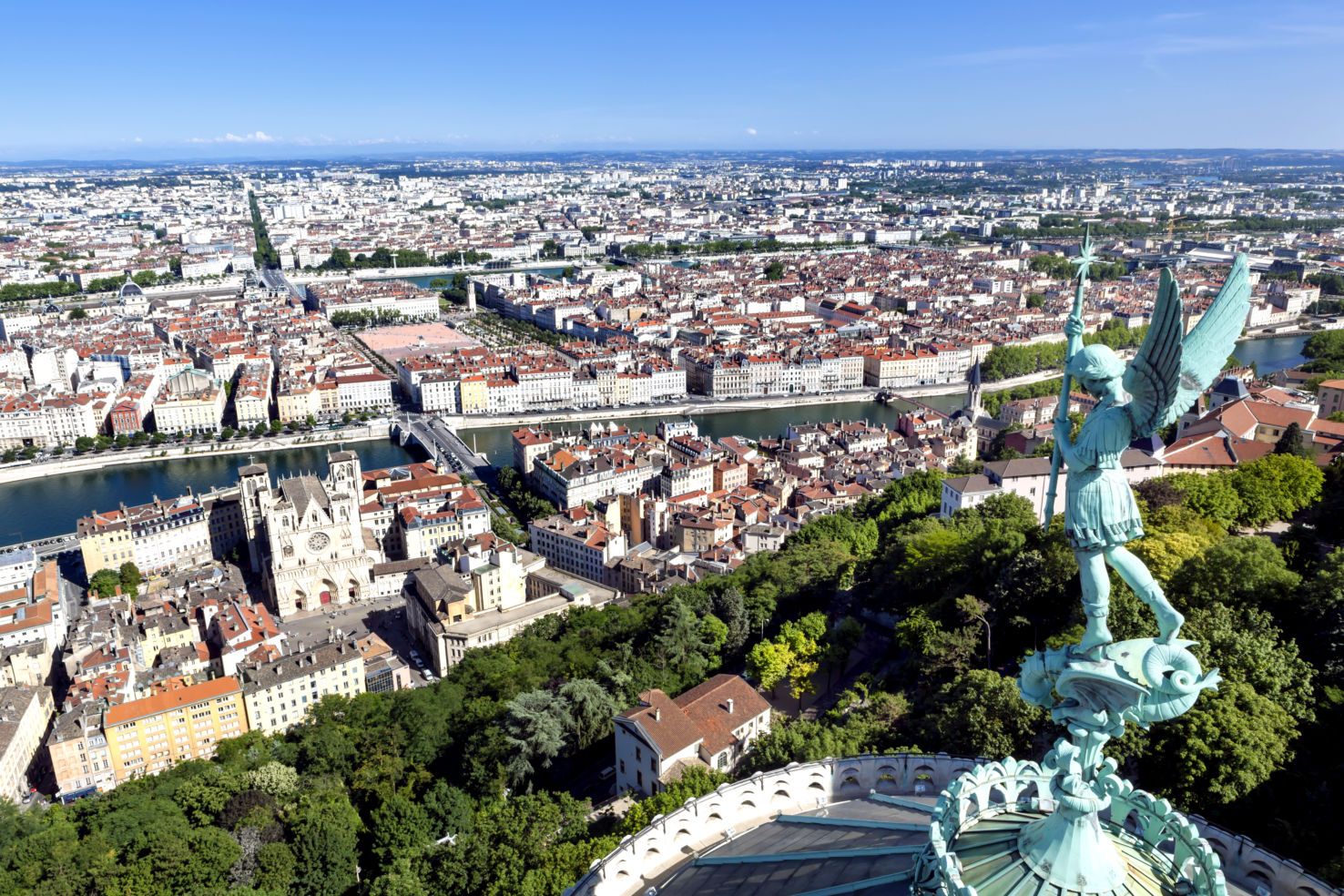 a statue of St. George atop Notre Dame de Fourviere, in Lyon