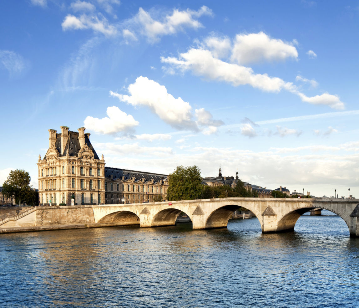The Louvre Museum as seen from the River Seine in Paris.
