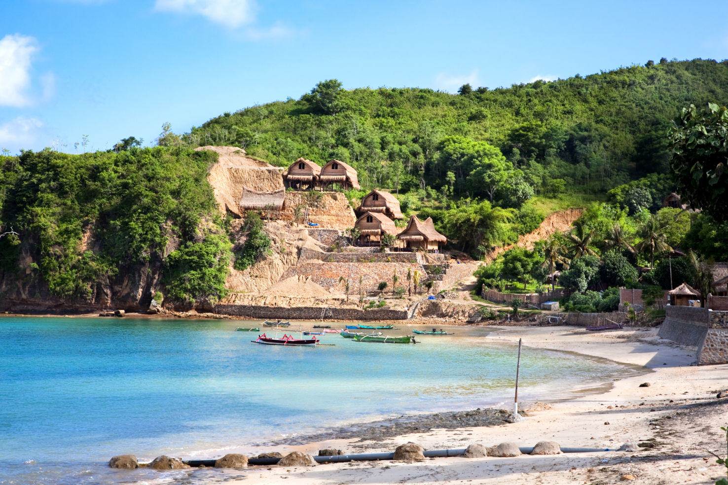 Bay of Bangah fishing village with traditiona Lombok houses; Lombok, Indonesia