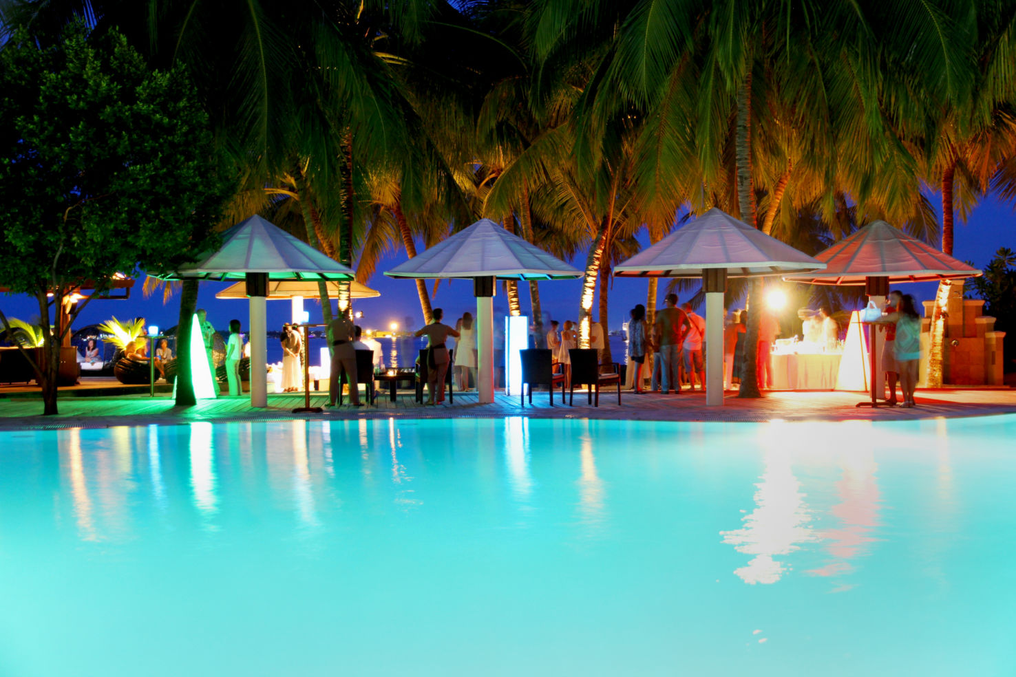 Cocktails by the pool at Kurumba Maldives