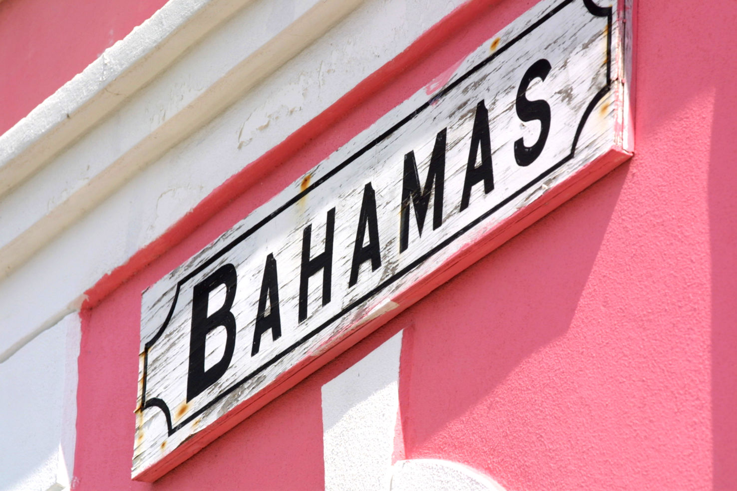 Welcome to the Bahamas - Bimini Island. A sign is wall-mounted.