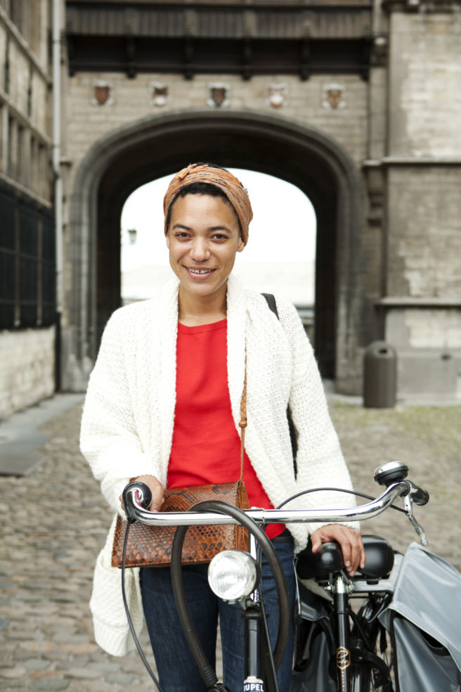 Street Fashion, Antwerp. A woman in front of Het Steen, the midevil fortress in Antwerp.