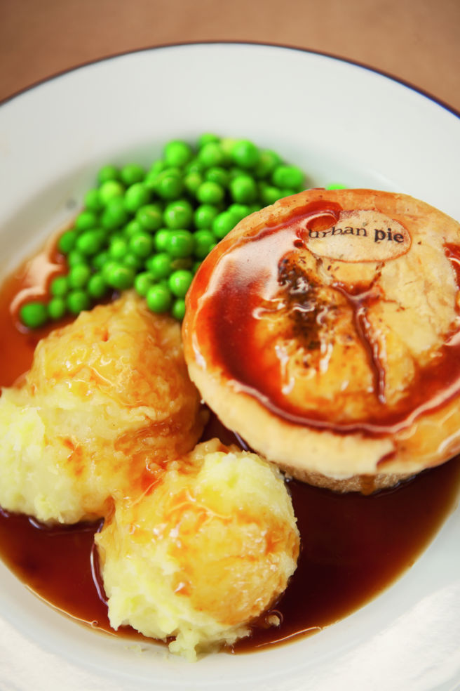 A pie with the sides: traditional mash, garden peas and gravy