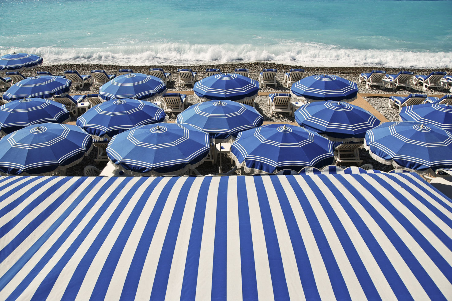 Umbrellas on the beach in Nice, France