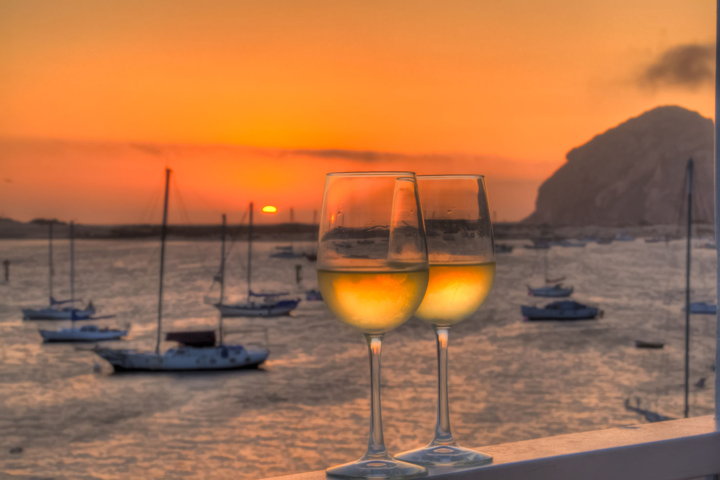 Sharing a bottle of wine at sunset