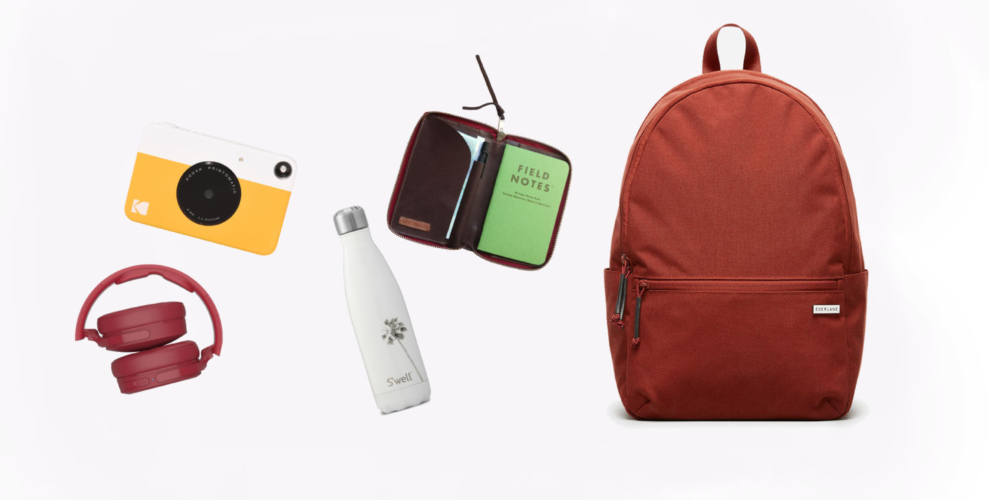 backpack headphones camera bottle notebook